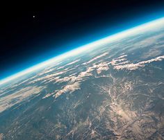 An image taken from a high altitude balloon on Dec. 20, 2014, shows the curvature of the Earth with the towering Rocky Mountains below.